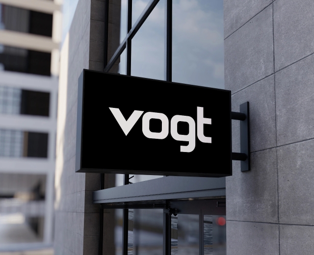 Vogt Industries wall sign with logo