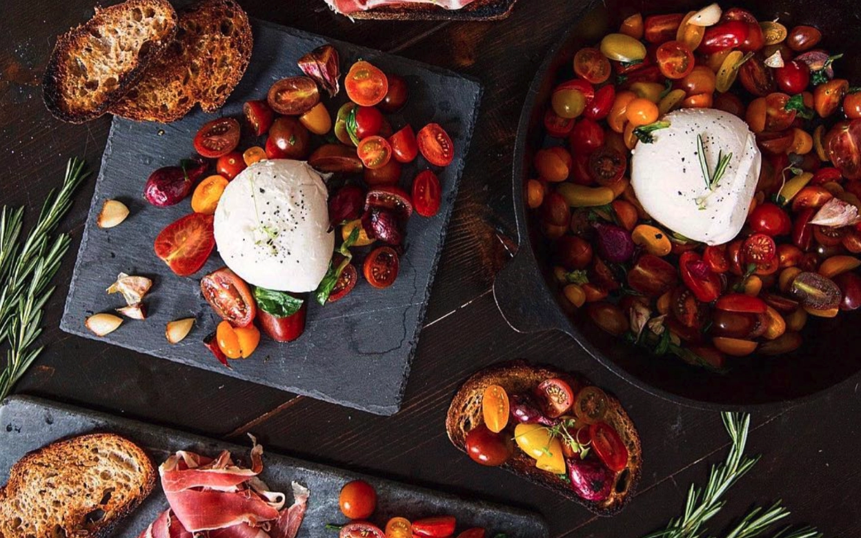 Harvest Wagon tomatoes and cheese in cast iron pan