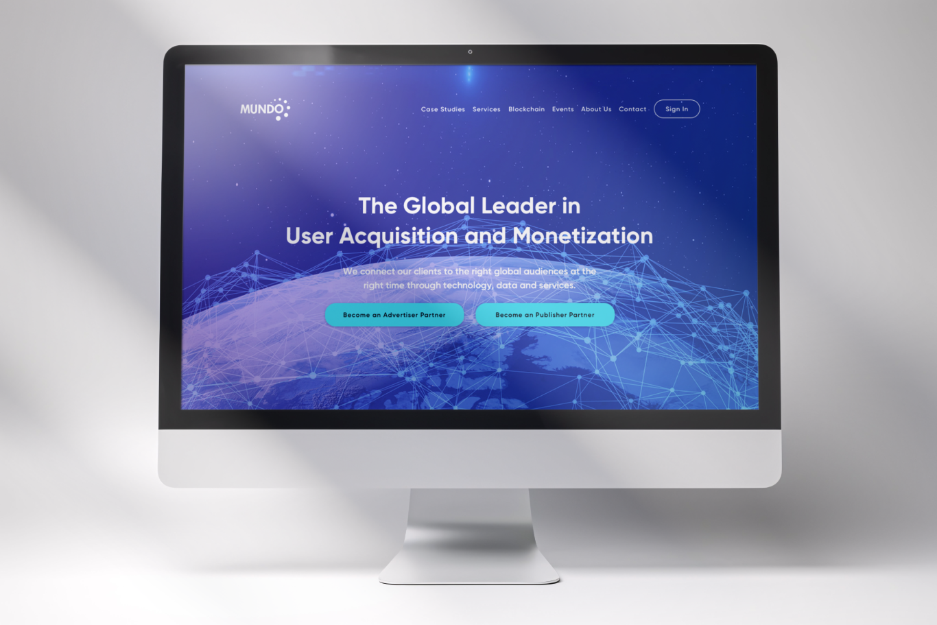 Mundo website mockup on a mac computer